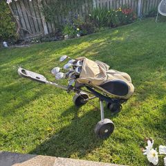 Ladies golf clubs, bag and caddy car