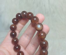 bracelet red moonstone large beads elasticated sizs