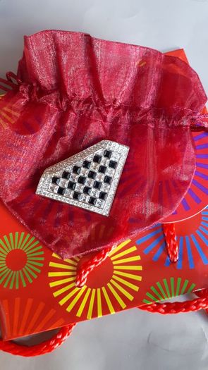 New brooch in gift pouch and paper gift bag