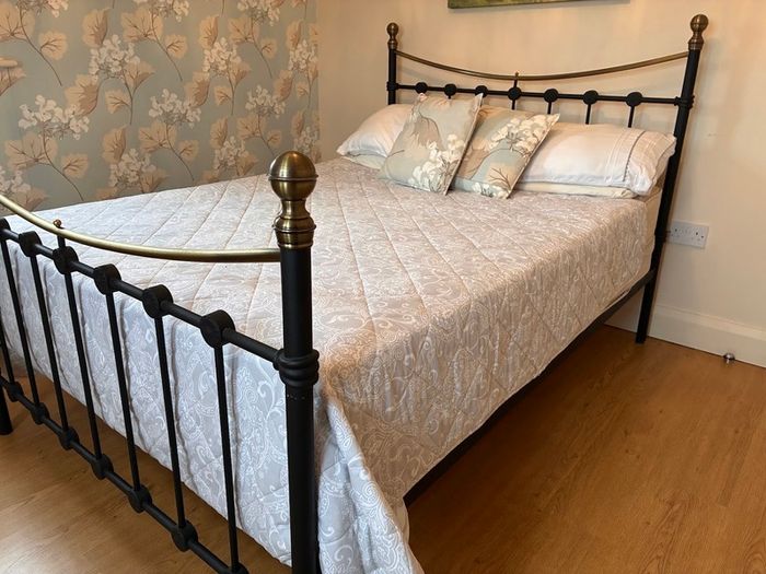 Black metal and brass double bed frame c/w mattress