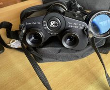 Zeica optical company battery operated zoom binoculars with extra lens that screws to front of