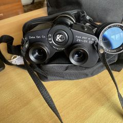Zeica optical company battery operated zoom binoculars with extra lens that screws to front of