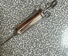 Vintage stainless chrome medical device  "Fannin Dublin" ear syringe  horror prop