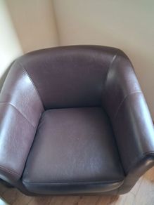 2 chocolate faux leather armchairs