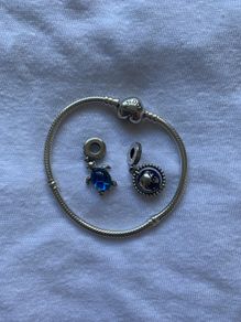 Pandora silver bracelet and 2 charms