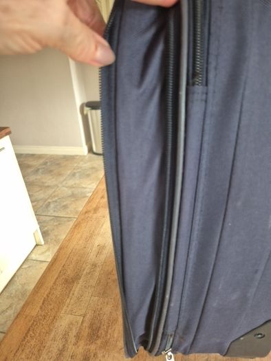 small navy suitcase