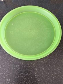 large round plastic tray