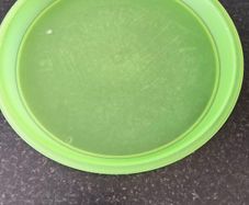 large round plastic tray