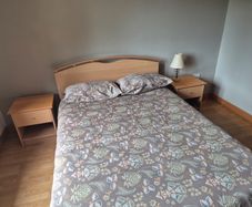 double bed with two side tables