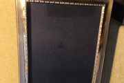 A sterling silver glazed photo frame in total dimensions 8 1/4 x  x 6 1/4 inches take photo 7 x 5 inches. Set with velvet mounts in very good condition.