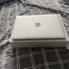 MacBook Pro w/ original charger and box