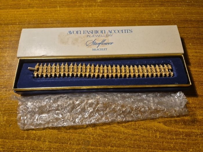 Rare Find. 1960s Avon Starflower gold plated bracelet in original box.