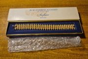 Rare Find. 1960s Avon Starflower gold plated bracelet in original box.