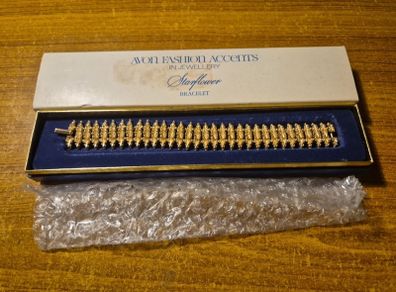 Rare Find. 1960s Avon Starflower gold plated bracelet in original box.