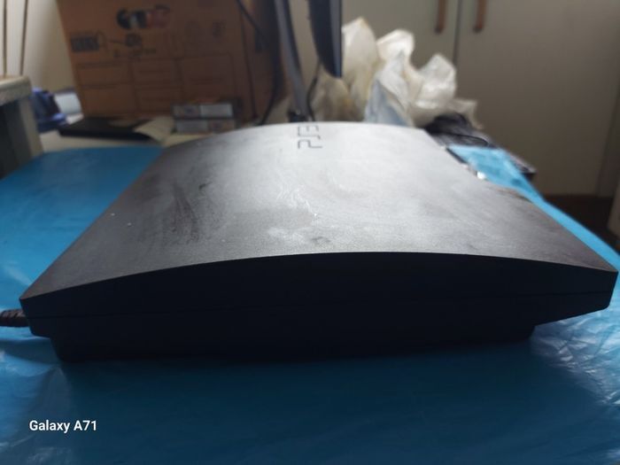 Playstation 3 Thin style, comes with power cable only, Powers on and off, dont know anymore