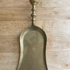 brass shovel