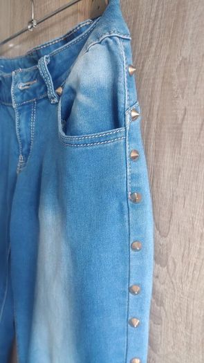 New koucla jeans with studs size small