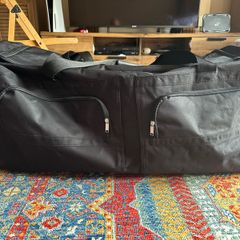 black extra-large wheeled duffel bag like new
