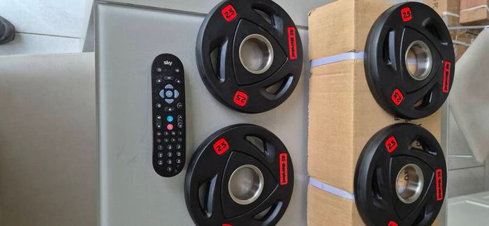 brand new 4x2.5kilo olympic weight plates