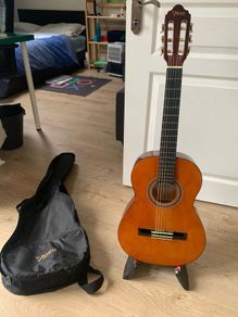 Valencia guitar, very good condition, with stand and case