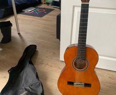 Valencia guitar, very good condition, with stand and case