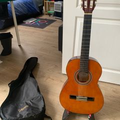 Valencia guitar, very good condition, with stand and case