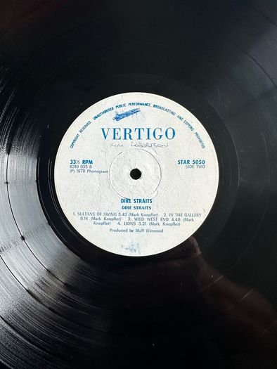 Dire Straits original release of Dire Straits. Vinyl is near mint except for some writing on label