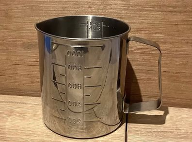 Stainless steel measuring beaker with a handle