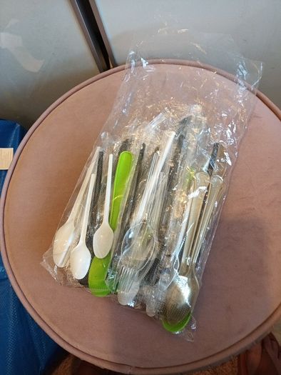 Bundle  of new disposable cutlery
