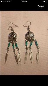 Brand new dreamcatcher earrings with feathers and turquoise beads