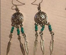 Brand new dreamcatcher earrings with feathers and turquoise beads