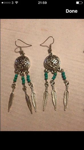 Brand new dreamcatcher earrings with feathers and turquoise beads