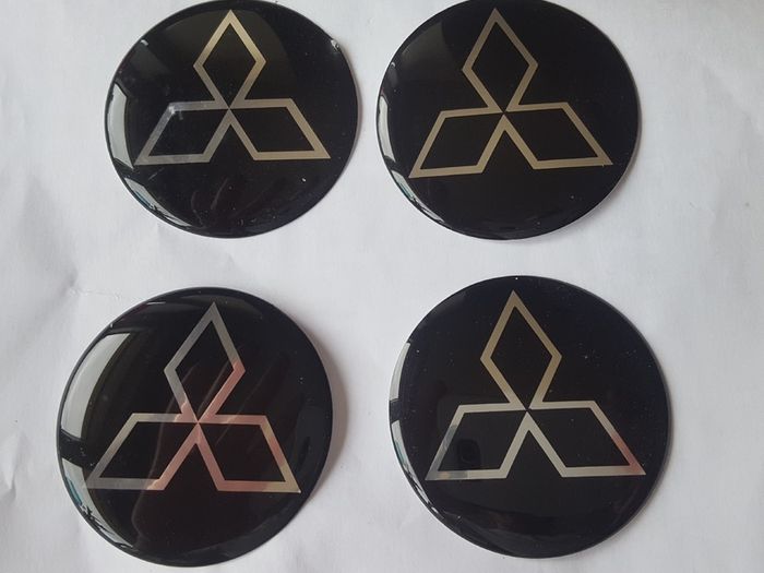 (Last Set) 4 x Mitsubishi Alloy Wheel Centre Badges (60mm) Delivery