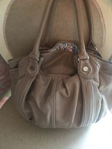 Oushka leather bag. As new.