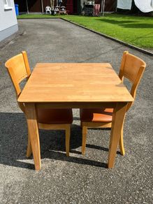 pine table and 2 chairs