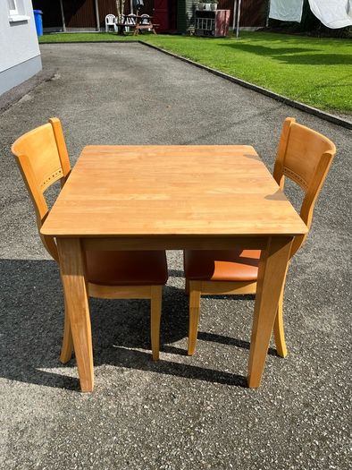 pine table and 2 chairs