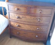 Bowfront mahogany chest of drawers.