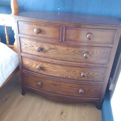 Bowfront mahogany chest of drawers.