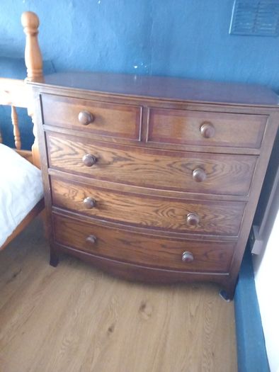 Bowfront mahogany chest of drawers.