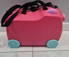 pink Trunki with long strap and key