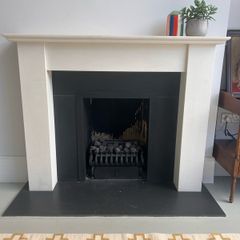 Modern style limestone fireplace and gas fire basket