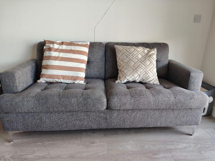 Grey fabric sofa and glass top dining table set