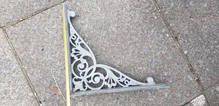 antique shelf support/hanging basket holder.