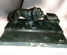 Antique black marble inkwell with lion