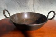 Large heavy antique copper dish with ring handles.