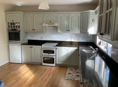 Kitchen cabinets and Black granite countertops
