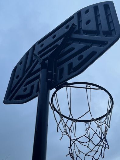 Portable Basketball Stand- Adjustable. stored in garage when not in use. In Very Good Condition.