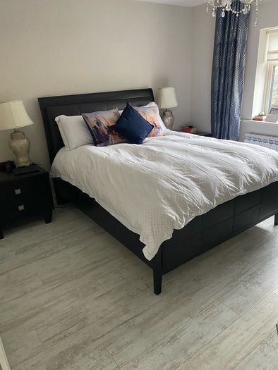 king size bed with matching lockers and lamps