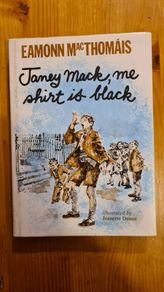 Janey Mac Me Short Is Black. By Eamonn Mac Thomas. FIRST EDITION. Hardback With Dustjacket In Very Good Condition. Published By The O'Brien Press  Dublin.
