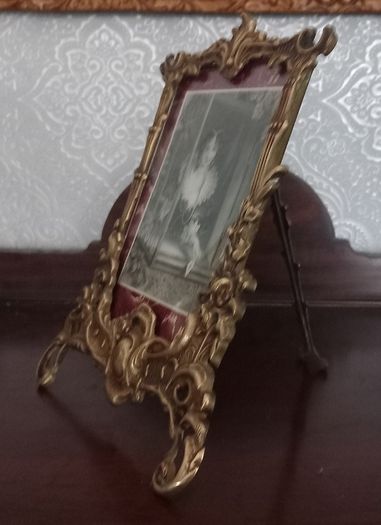 Pair of brass picture frames.